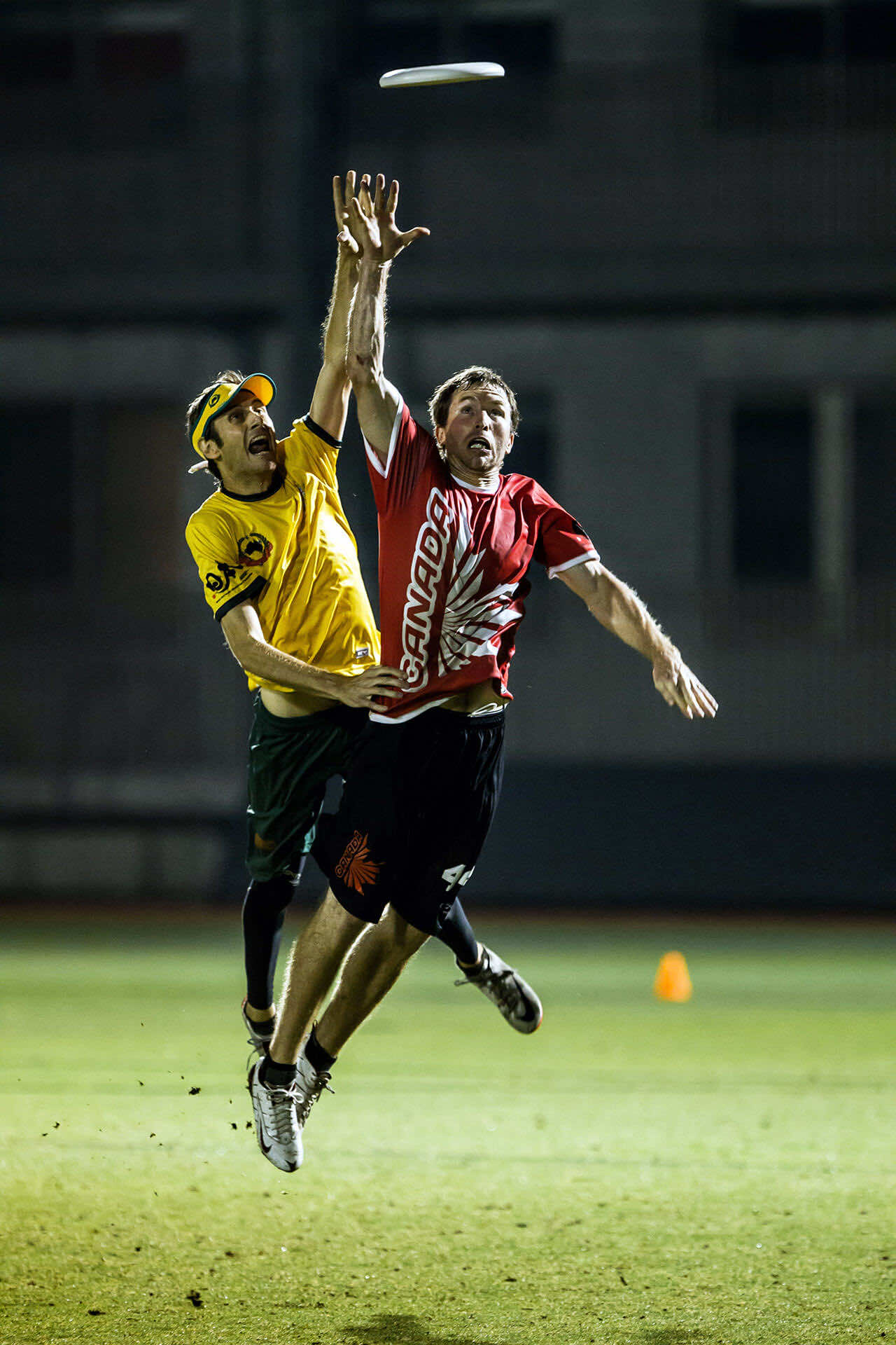two men playing ultimate frisbee